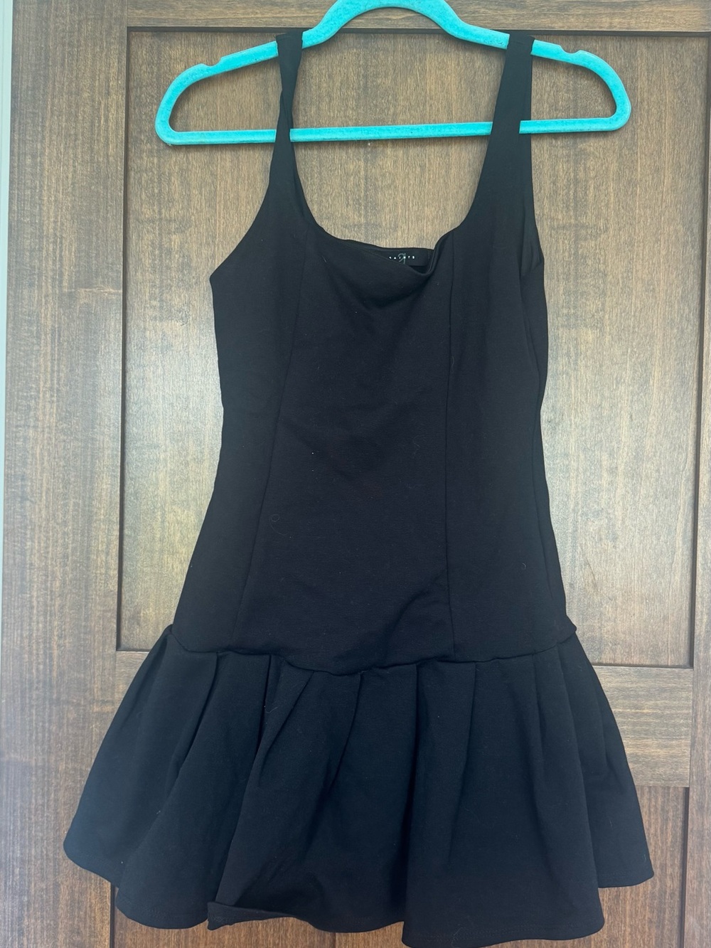 Black Sleeveless Peplum Mini Dress
